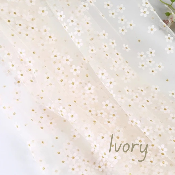 Ivory tulle with daisies